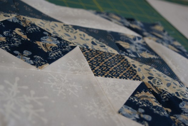 Close-up of That Crafty Cara's Snowflake Trapunto Pillow