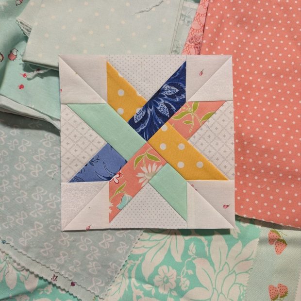 A Woven Star quilt block made by That Crafty Cara (Cara Brooke) for her Star Climber Scrap Quilt.