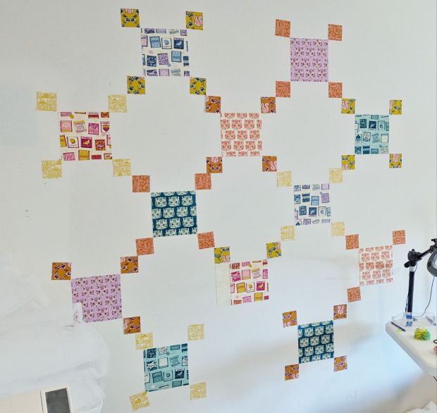 Cottage Quilt in progress, made with "Reading Nook" fabric collection in teal, orange, and purple fabrics