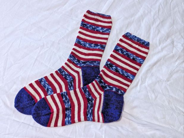 Handknit socks made with self-striping American Flag yarn from The Painted Tiger.