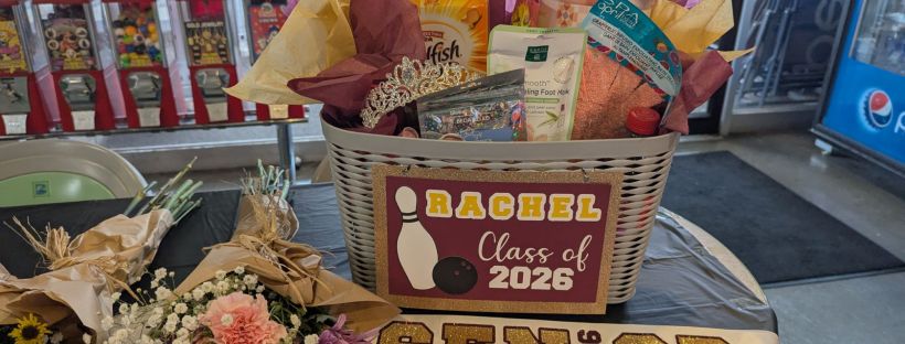 High school senior girl bowling senior night with personalized sash and gift basket in maroon and gold