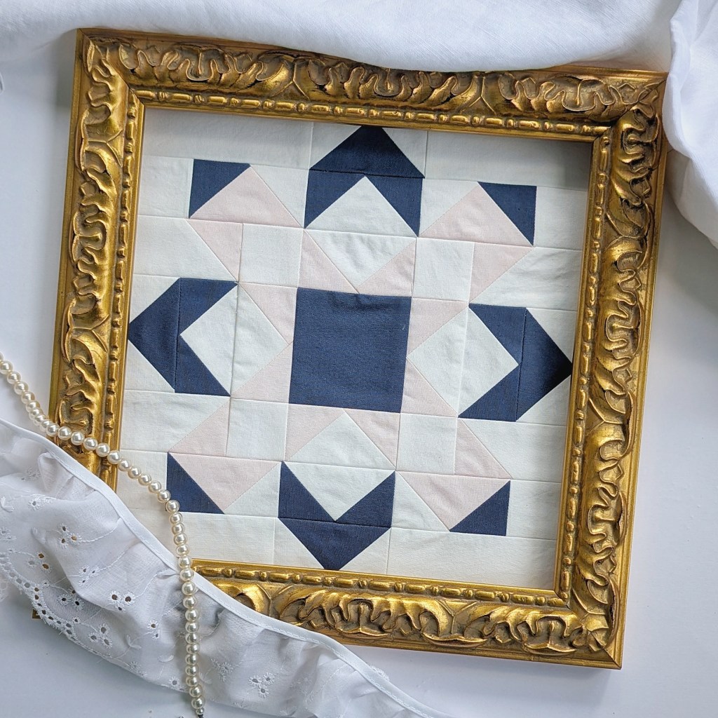 Block 8 “Turning Point” by Sandy Gervais in the RBD 2026 Block Challenge Sew Along sewn in navy and pinks