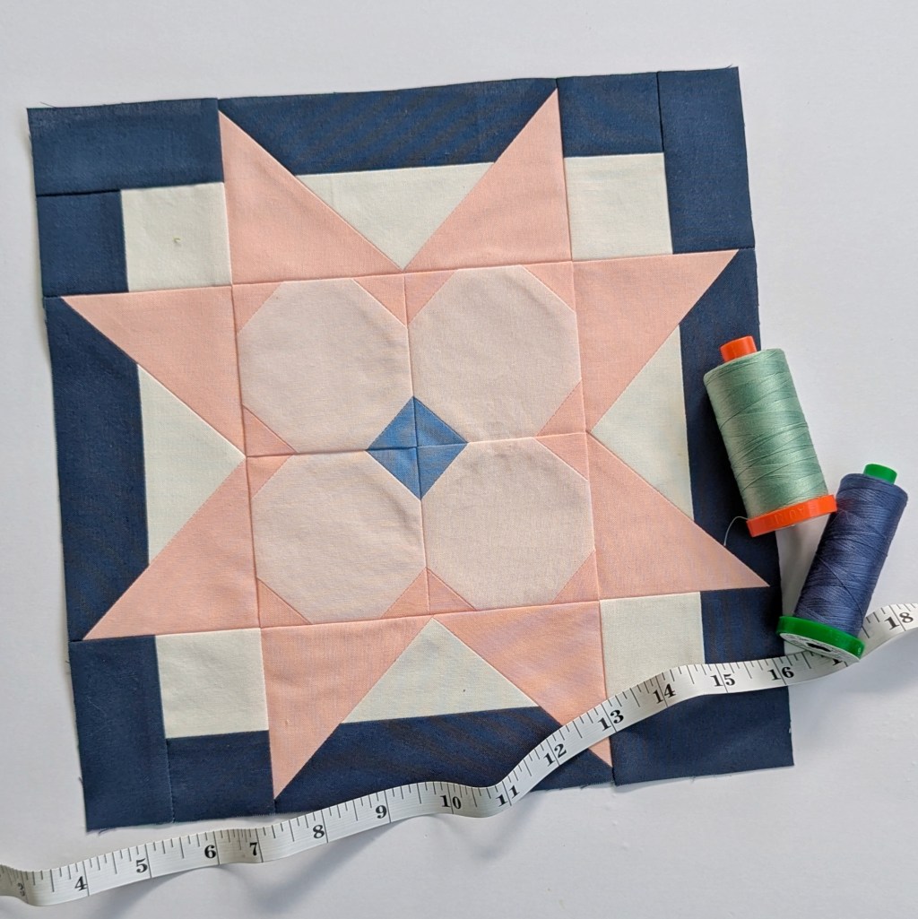 Block 3 “Starry Bloom” by Cherry Guidry in the RBD 2026 Block Challenge Sew Along sewn in blues and pinks