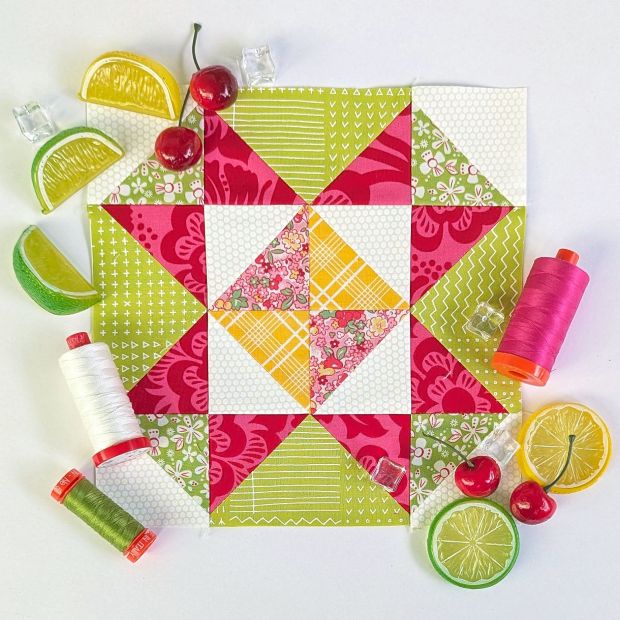Sewcialites 3 Block #8 Beacon made with green, yellow, and pink fabrics.