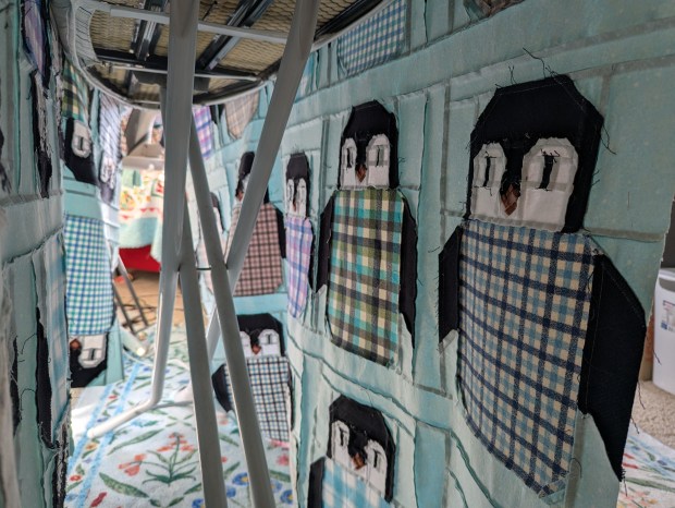 Penguin Party quilt top in-progress, made from aqua and pastel flannel fabrics