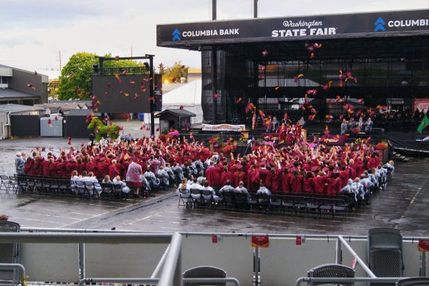 White River High School graduates toss graduation caps