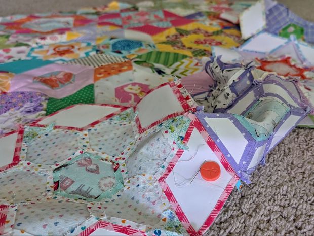 A Smitten English paper-pieced quilt in-progress.