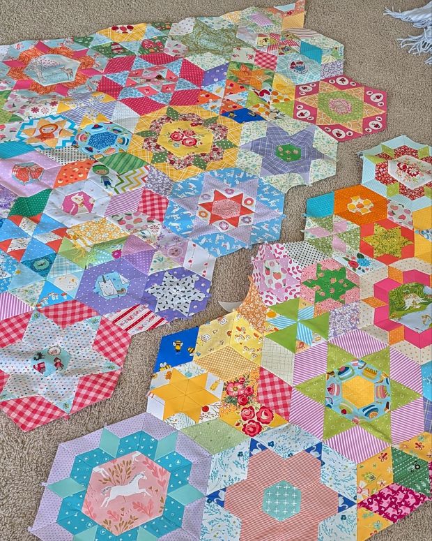 A Smitten English paper-pieced quilt in-progress.